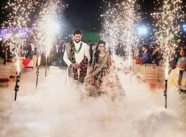 Bride and groom entry with sparkler effects